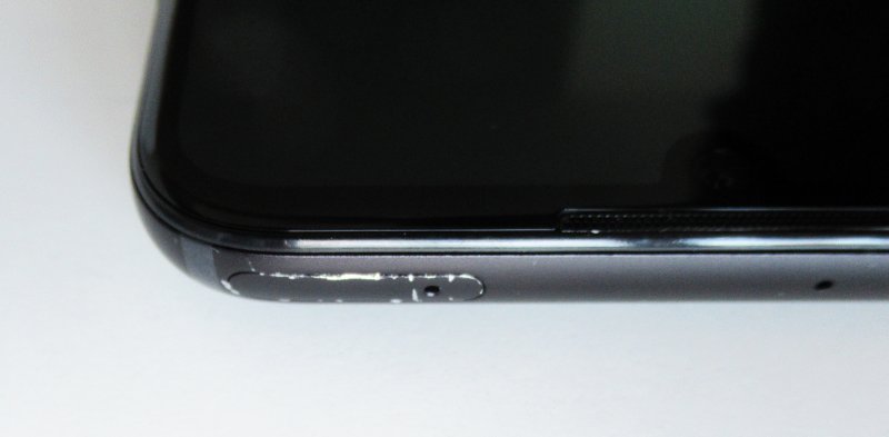 Scratched SIM tray cover